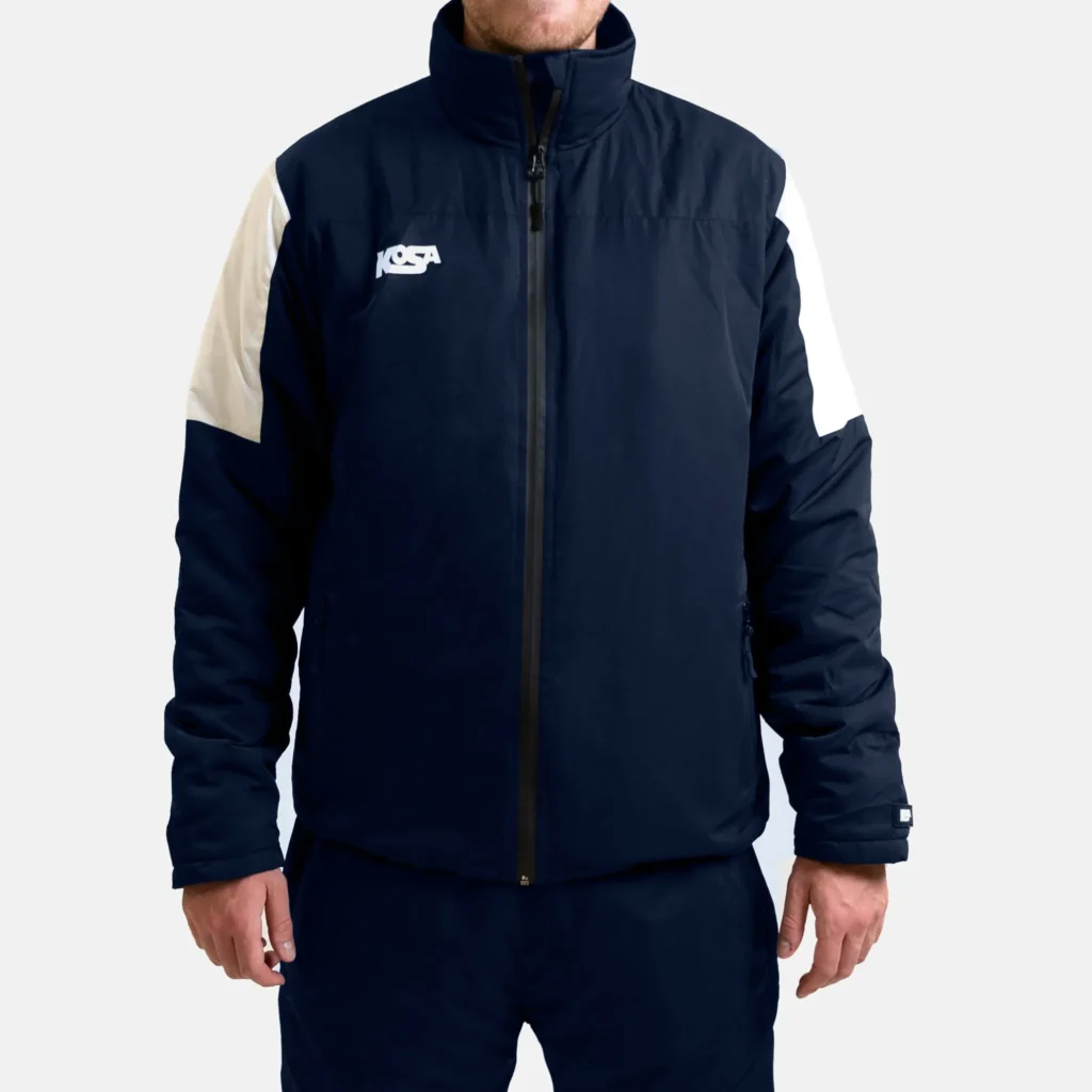 Marinblå överdragsjacka med vita paneler – Team Performance Classic.